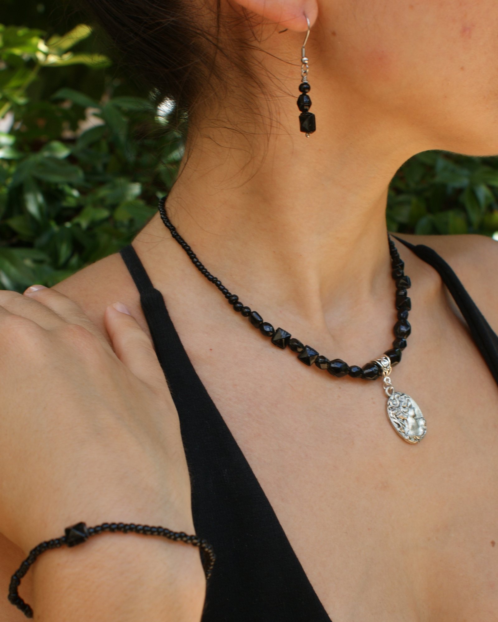 Black upcycled set with medallion - necklace, bracelet, and earrings (alternate view)