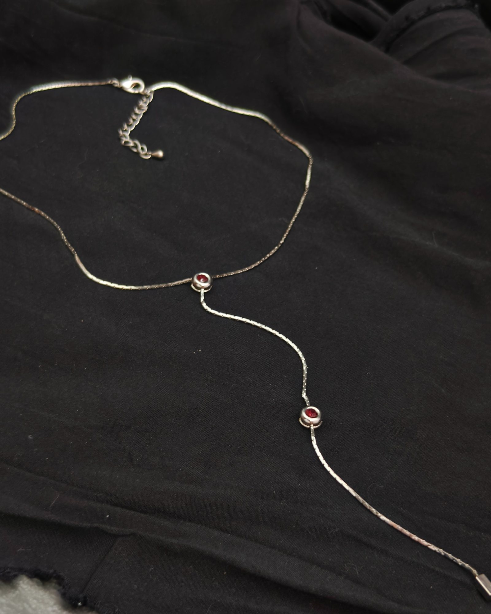 Lariat necklace with purple cubic zirconia (alternate view)