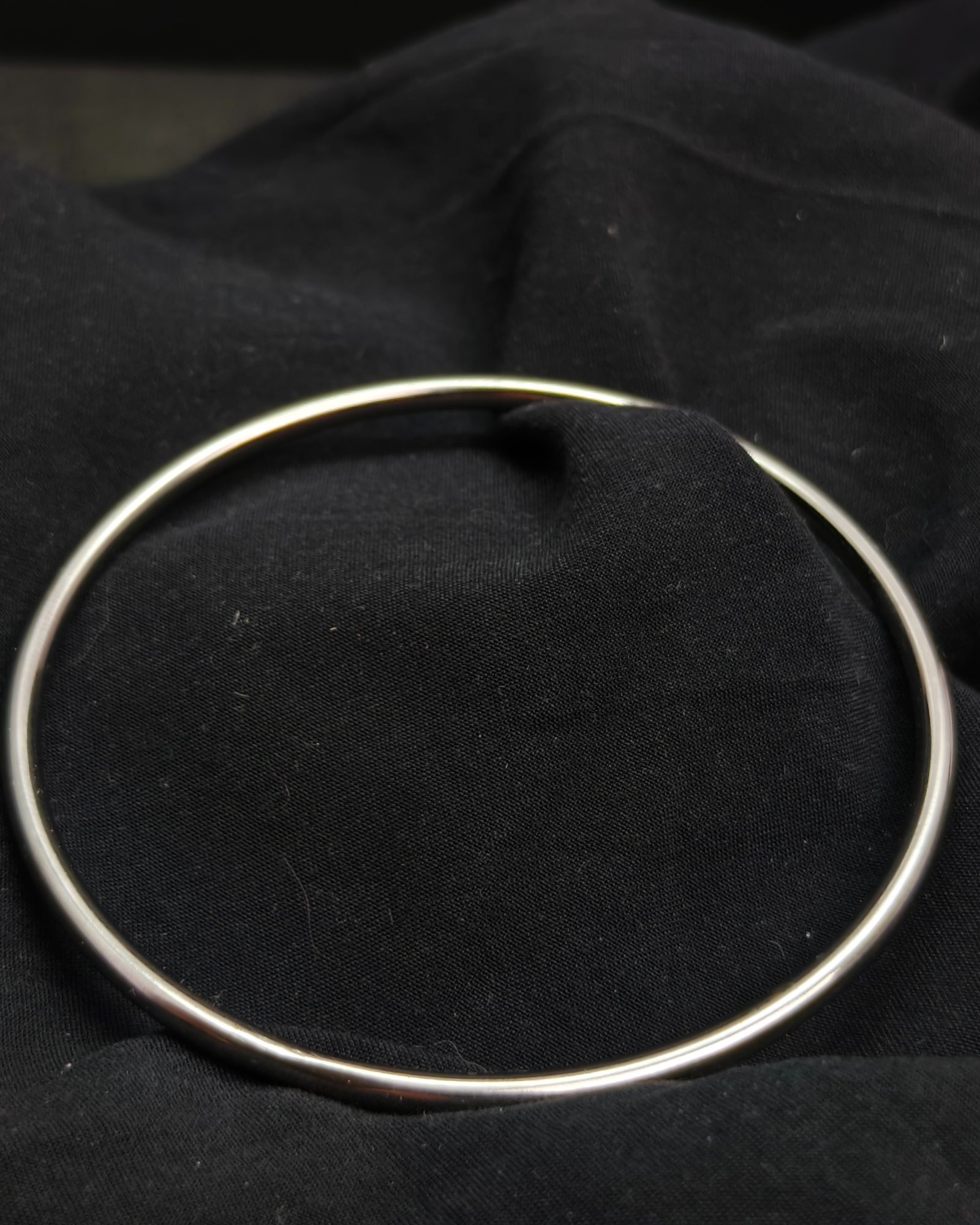 Silver tone slave bracelet