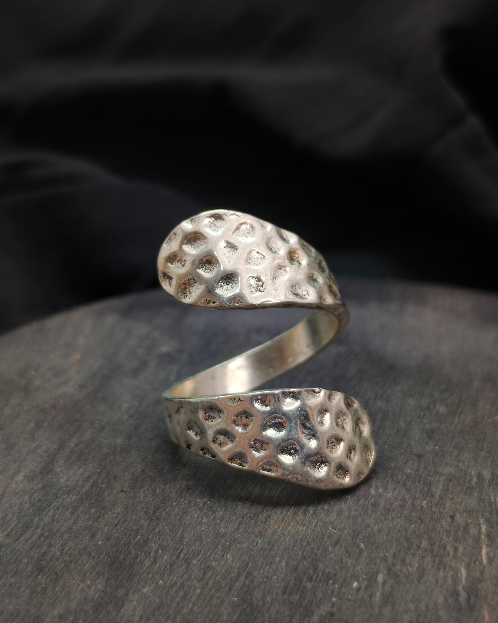 Double helix riveted ring
