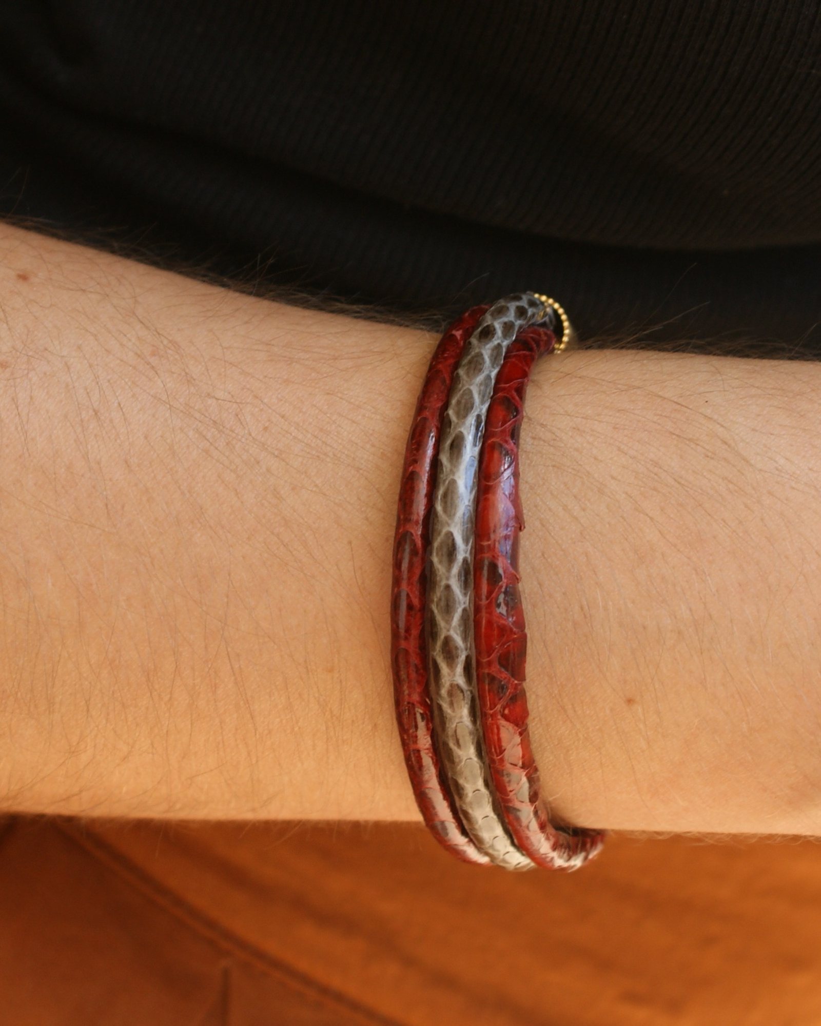 Red bracelet with snakeskin effect (alternate view)